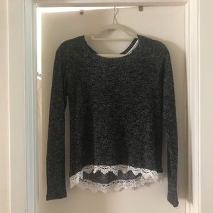 Light weight sweater with laced bottom